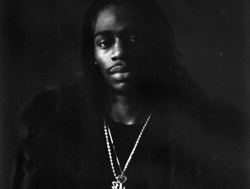 Black and white portrait of Russ Millions