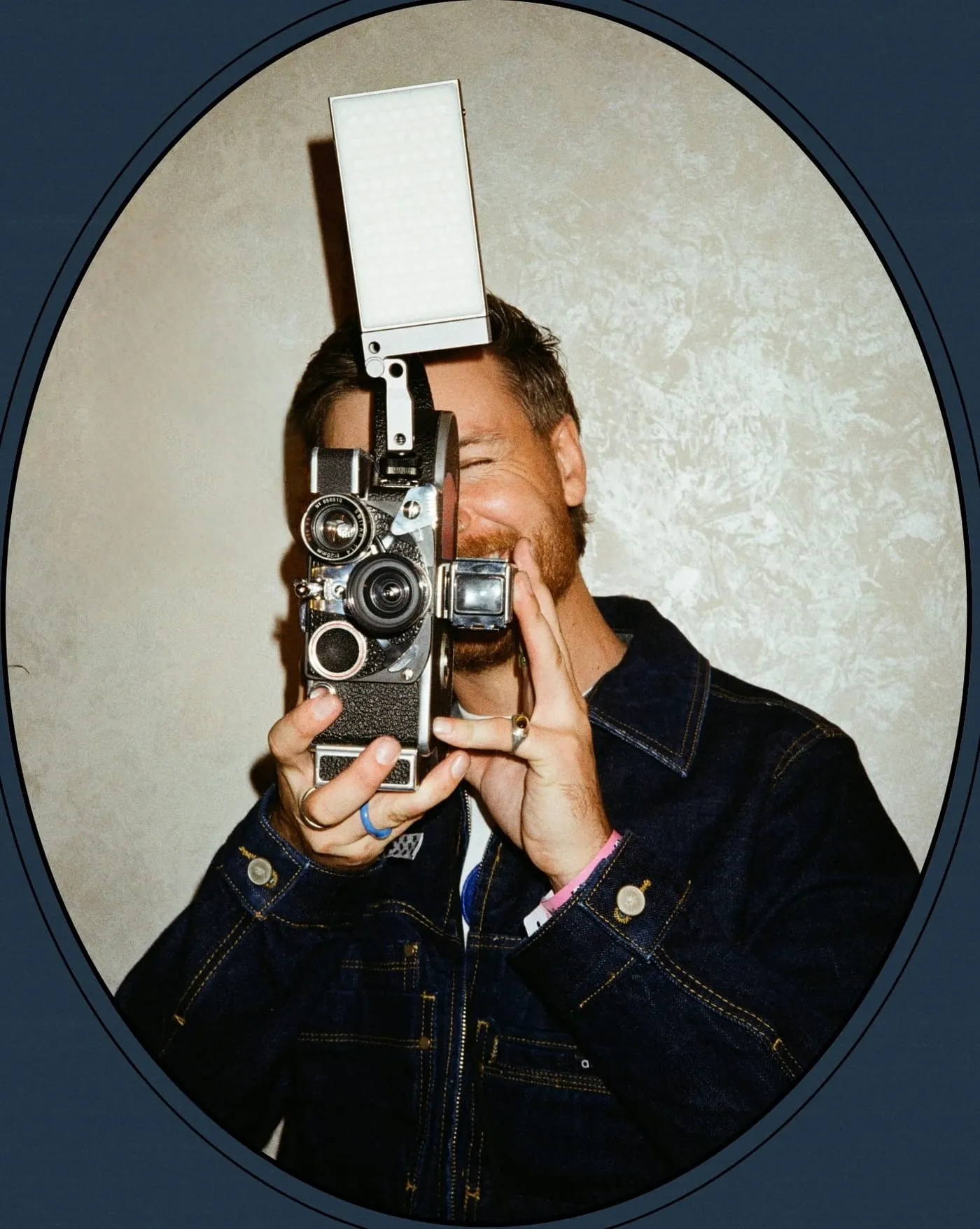 Will Beach behind a vintage cine camera